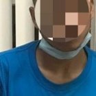 Uno de los detenidos le hizo señas al otro para advertirle de la presencia policial.