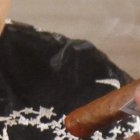 Brujita Shirley en acción fumando los cigarros con el ayuahuasca.