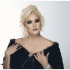 Kathy Elisa estuvo a punto de colapsar, según su esposo.