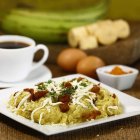 La preparación del tigrillo es parte del patrimonio alimentario de Zaruma. Tiene como base al verde, queso, huevo y cebolla.