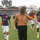  Rubén Dario Insúa y los jugadores del Deportivo Quito luego de obtener cupo al repechaje de Libertadores en diciembre de 2013. 