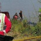  El helicóptero policial que participaba en las tareas de búsqueda ha localizado el cuerpo a unos 35 kilómetros del lugar en el que se hundió. 