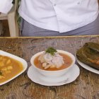  Unas son más condimentadas que otras, contienen mariscos, cárnicos, embutidos, plátanos (verde), y varias de ellas llevan el acompañante favorito, el arroz. 