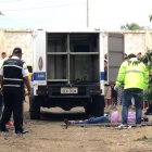  La policía hizo el levantamiento del cadáver.  