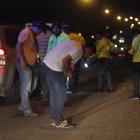  Miembros de las policía recaban información  