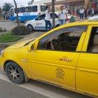 El taxi tenía el logo de una cooperativa de Santo Domingo. 