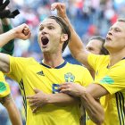  Jugadores celebran su paso a cuartos de final.  