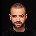 Nacho es un cantante de música urbana de 38 años de edad.