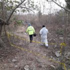 Los cuerpos fueron abandonados en una vía al recinto Los Palitos.