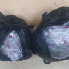 En esta bolsas habían 19 paquetes con un total de dosis de heroína, que estaban en poder de una mujer.