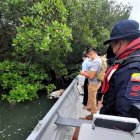 Entre unas ramas de un árbol flotaba la víctima.