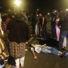 El cuerpo quedó tendido en la calle. Supuestamente huía luego de robar a unas personas.