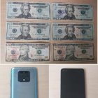El celular y el dinero incautados al sospechoso.