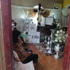 Fernando Quiñónez fue velado junto al cheque simbólico que se ganó.