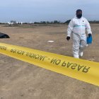 Gente de Criminalística, en el lugar de los hechos.