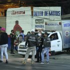 Christoffer Pezo Macías fue acribillado en el interior de este negocio.