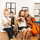 Hallan evidencias de beneficios cognitivos en niños por tocar un instrumento
