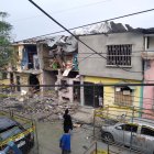 Destrucción de viviendas, cinco muertos y veinte heridos fue el saldo de la explosión en la calle que suele ser empleada como bailadero.