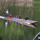 Con ayuda moradores en canoas recuperaron los cuerpos.