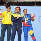 La medallista olímpica Neisi Dajomes va bien en el cambio de 76 a 87 kg: oro y récord regional.