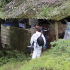 El cadáver de la mujer estaba en el piso dentro de esta vivienda.
