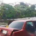 Uno de los cuerpos estaba en la cajuela del carro y el otro en el asiento posterior.