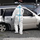 El agente asesinado que conducía este carro estaba gozando de sus días francos.