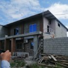 En esta vivienda de la lotización Ideal asesinaron a balazos a la joven.