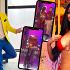 Capturas del momento en que Nathalie Carvajal le roba un beso al presentador Jorge Heredia.