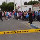 La mujer fue asesinada de varios disparos.