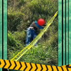 Los dos cuerpos estaban en un terreno con maleza.