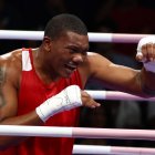 Gerlon Congo festejó luego de la victoria ante el brasileño Abner Teixeira en París 2024