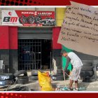 En este local de llantas, ayer lanzaron un artefacto explosivo y dejaron un pedazo de papel con una amenaza escrita a mano.