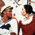 Robin Williams, como Popeye, y Shelley Duvall, como Oliva Olivo, durante le rodaje de la película.