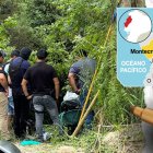 En un terreno de espesa vegetación encontraron los cuerpos alrededor de un carro.