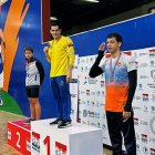 Esteban Enderica (c) ganó en 400 metros combinado, 200 metros mariposa y 1.500 metros libre.