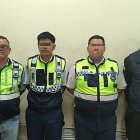 Los dos agentes, el conductor de la patrulla y el guardia del complejo judicial al momento de su detención.