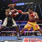 Floyd Mayweather Jr. (i) y Manny Pacquiao se enfrentaron en 2015.