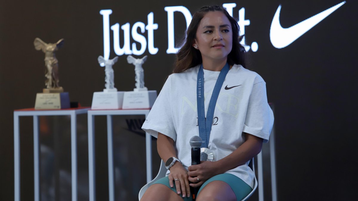 La medallista olímpica de marcha Glenda Morejón en uno de sus últimos conversatorios con las marcas privadas que la auspician en la capital.