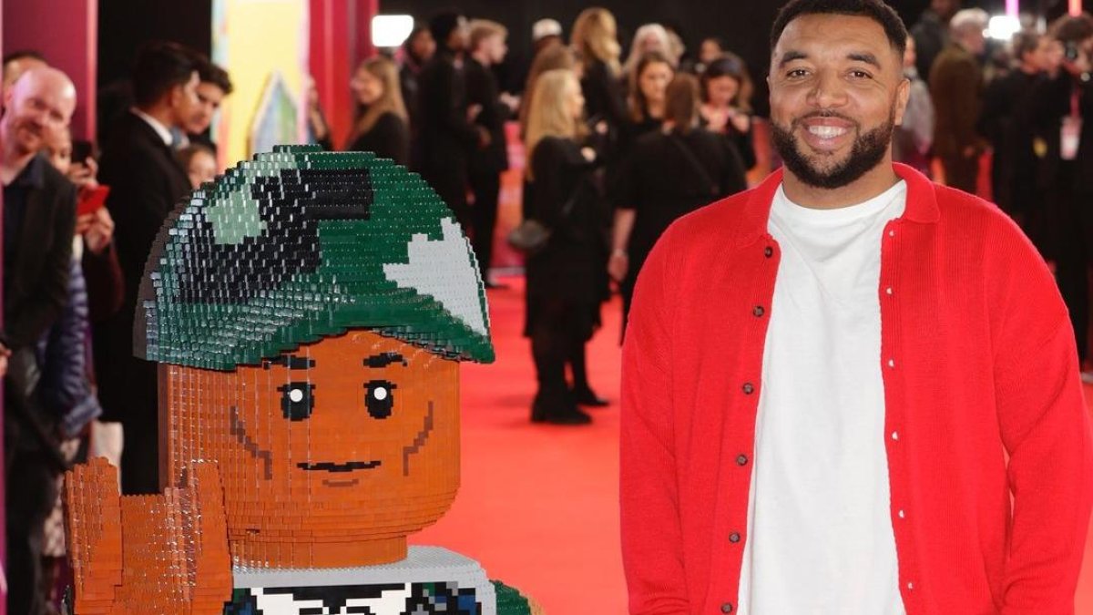Troy Deeney estuvo en en el lanzamiento de la película  Piece By Piece, la que relata la vida y carrera del músico Pharrell Williams