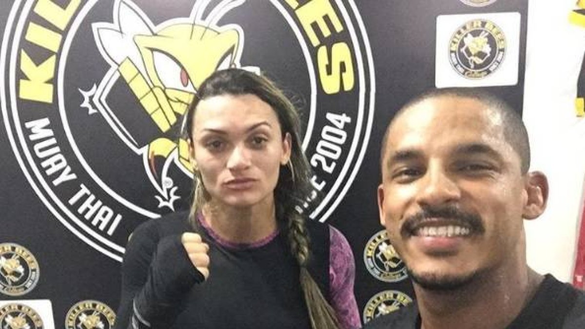 Joyce Vieira con su entrenador.