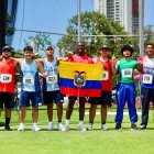 Patry Valdez (c) se quedó a 2 centímetros de imponer un récord mundial en su categoría.