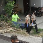 La víctima presentaba disparos en la cabeza y en otras partes del cuerpo. Fue llevada al Laboratorio de Criminalística. Estaba descalza.