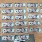 El dinero supuestamente falso encontrado en poder del ahora detenido.
