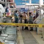 Agentes de la Dirección de Muertes Violentas (Dinased) realizaron indagaciones en el mercado.