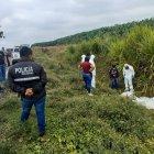 Peritos de la policía buscan indicios para determinar el móvil de este crimen.