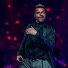 Fotografía de archivo fechada el 22 de octubre de 2021 que muestra al cantante puertorriqueño Ricky Martin mientras canta durante su concierto de la gira "Enrique & Ricky Live!" en el FTX Arena en Miami, Florida (EE.UU.).