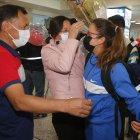 Luis Morejón y María Quiñónez recibieron felices a su hija Glenda, campeona mundial de marcha en la prueba de 35 kilómetros.