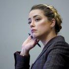 Fairfax (United States), 02/05/2022.- US actress Amber Heard listens in the courtroom at the Fairfax County Circuit Court in Fairfax, Virginia, USA, 02 May 2022. US actor Johnny Depp sued his ex-wife US actress Amber Heard for libel in Fairfax County Circuit Court after she wrote an op-ed piece in The Washington Post in 2018 referring to herself as a 'public figure representing domestic abuse.' (Estados Unidos) EFE/EPA/STEVE HELBER / POOL