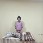 El detenido con las evidencias recabadas al momento de su captura.